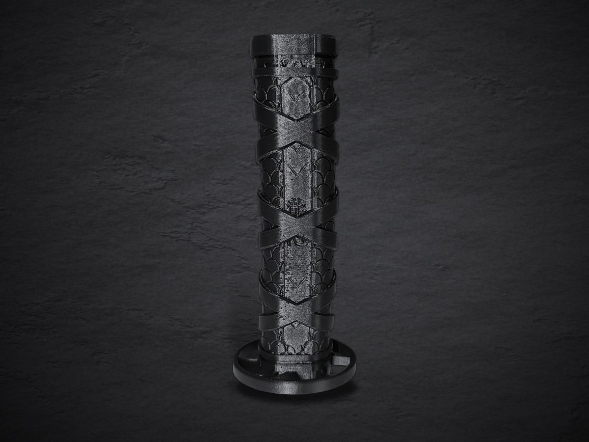 The collapsed Fukutsu standing upright on its round guard, with the whole blade nested inside the wrapped handle